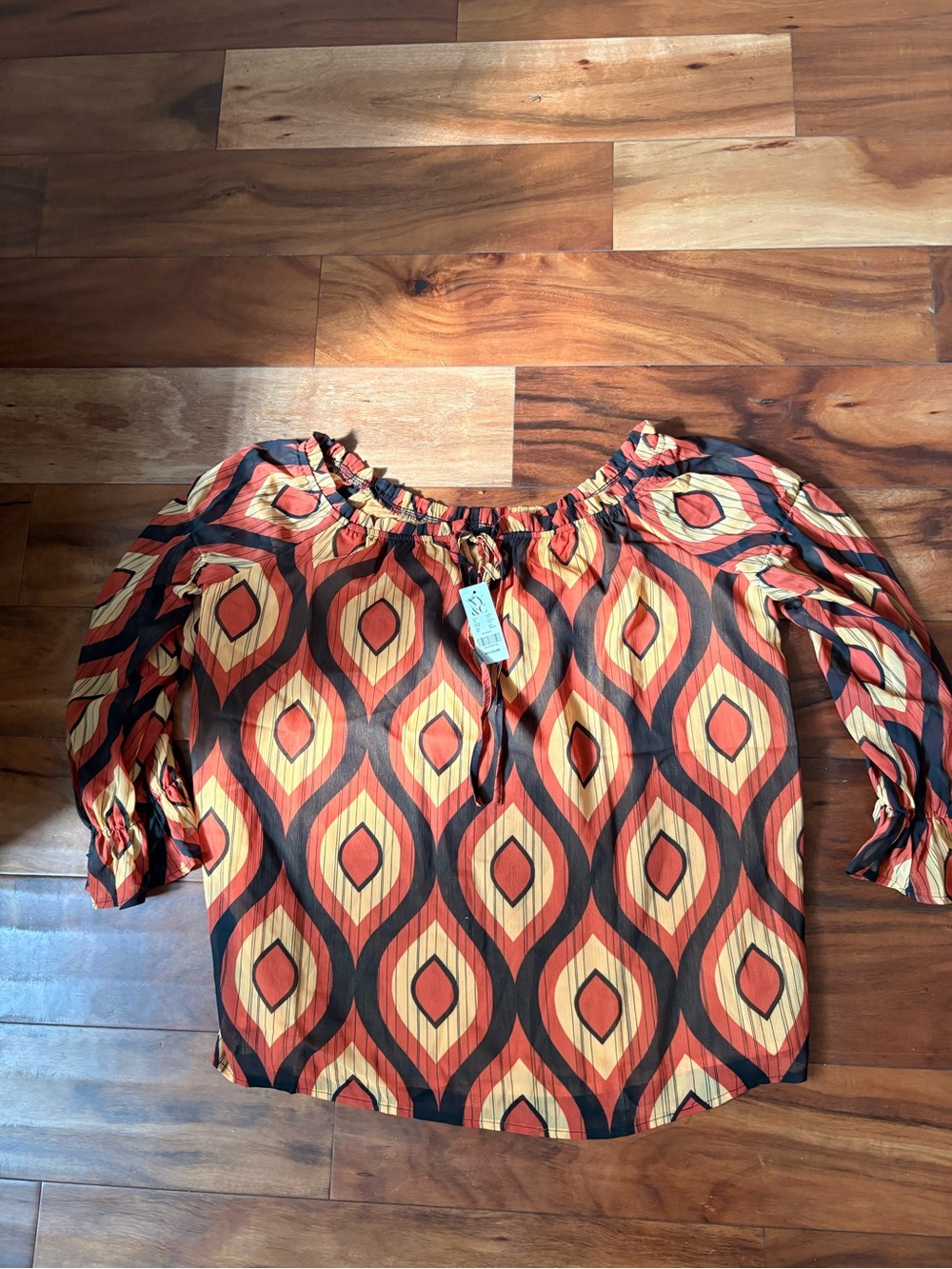 New York & Company Off-Shoulder Geometric Blouse in Red, Black & Cream
